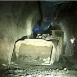 Underground mining with Outcast bucket. Bucket shown cutting windrows