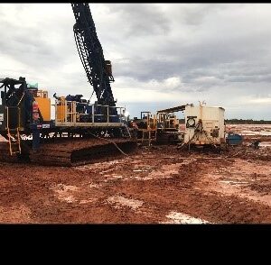 Drill rig working on muddy salt lake